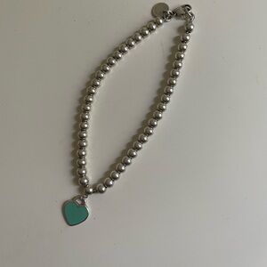 Tiffany & Co silver bracelet with heart charm